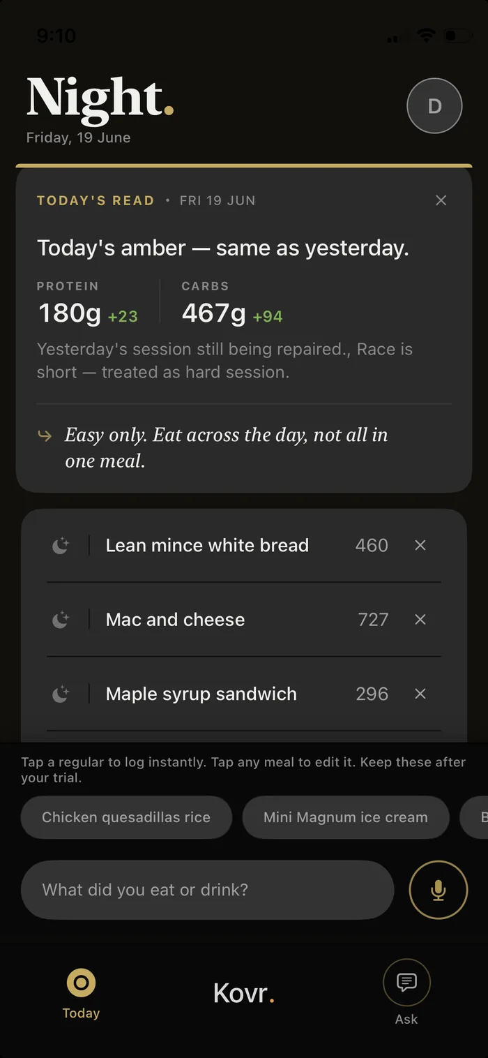 Kovr Today&rsquo;s Read for Friday 19 June — amber, same as yesterday. Protein 180g (+23) and carbs 467g (+94) carrying yesterday&rsquo;s session repair before a short race treated as a hard session, with the cue to eat easy and spread food across the day, above a logged meal list of lean mince on white bread, mac and cheese, and a maple syrup sandwich.